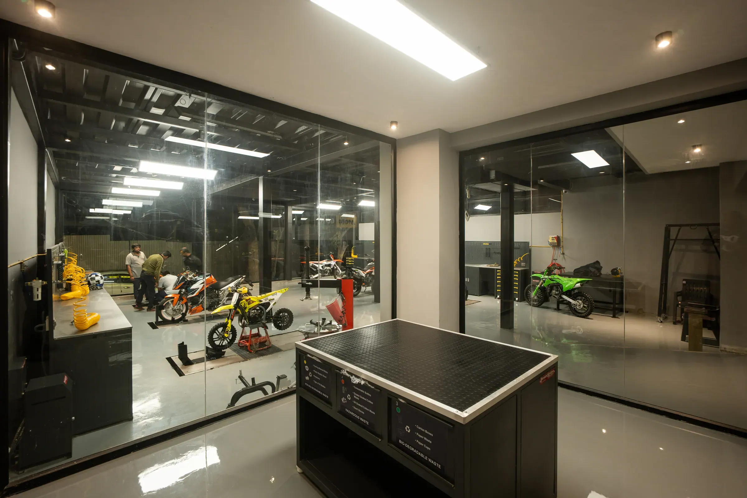The glass-walled clean room at Moto40 used for engine, suspension and ECU work